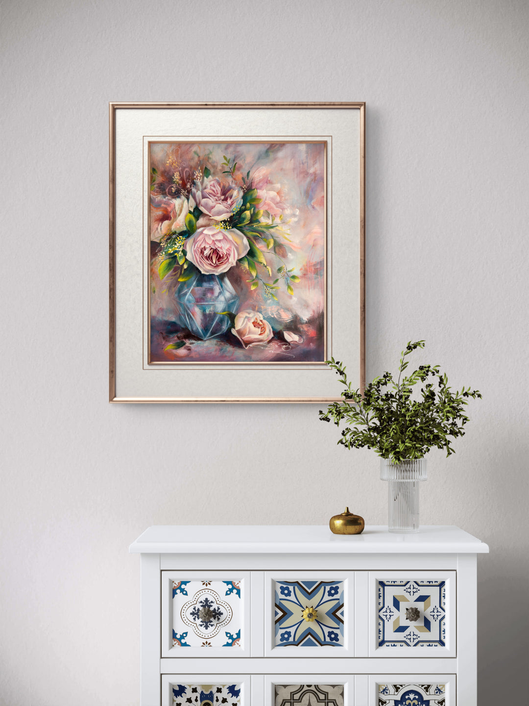 Large original romantic floral painting of pink flowers in a vase, framed and hanging on a wall in a calm, sanctuary-style modern home.