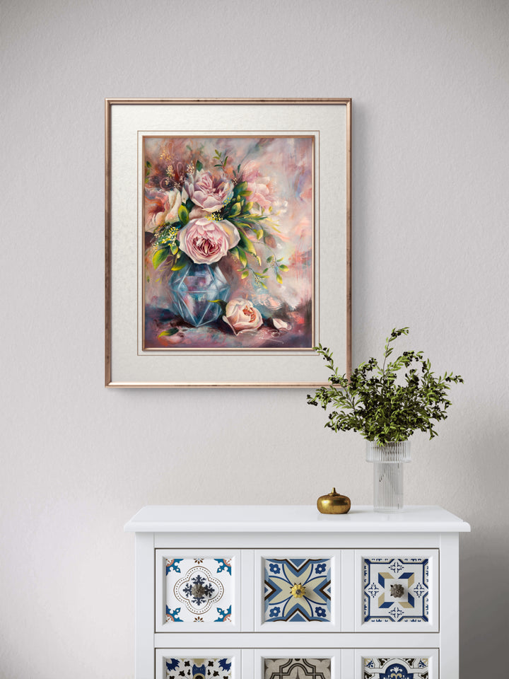 Large original romantic floral painting of pink flowers in a vase, framed and hanging on a wall in a calm, sanctuary-style modern home.