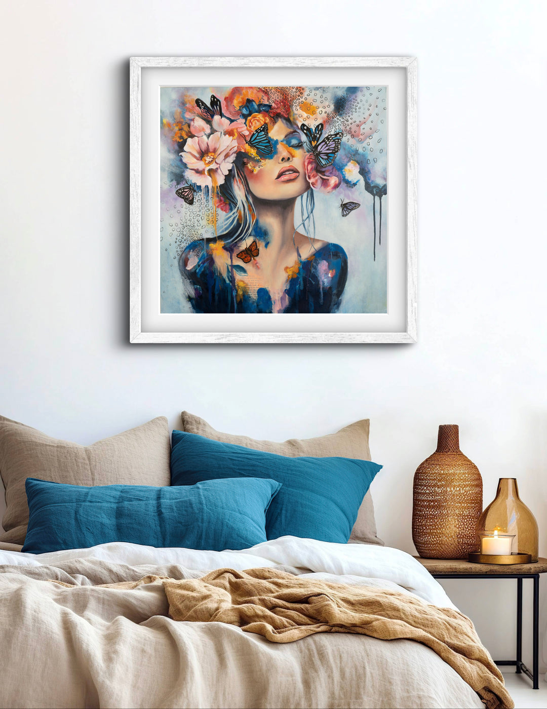 The 'Butterfly Dreams' art print by Tash Bardot hung in a serene bedroom setting. A dreamlike, expressive painting that brings a quiet rebellion and visual relief to modern spaces.