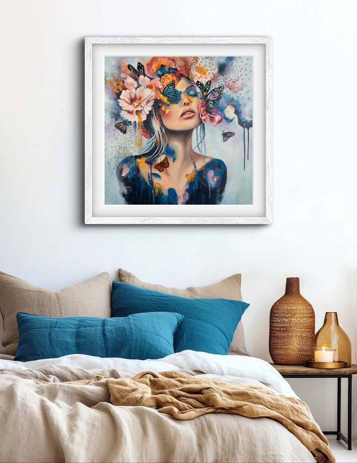 The 'Butterfly Dreams' art print by Tash Bardot hung in a serene bedroom setting. A dreamlike, expressive painting that brings a quiet rebellion and visual relief to modern spaces.