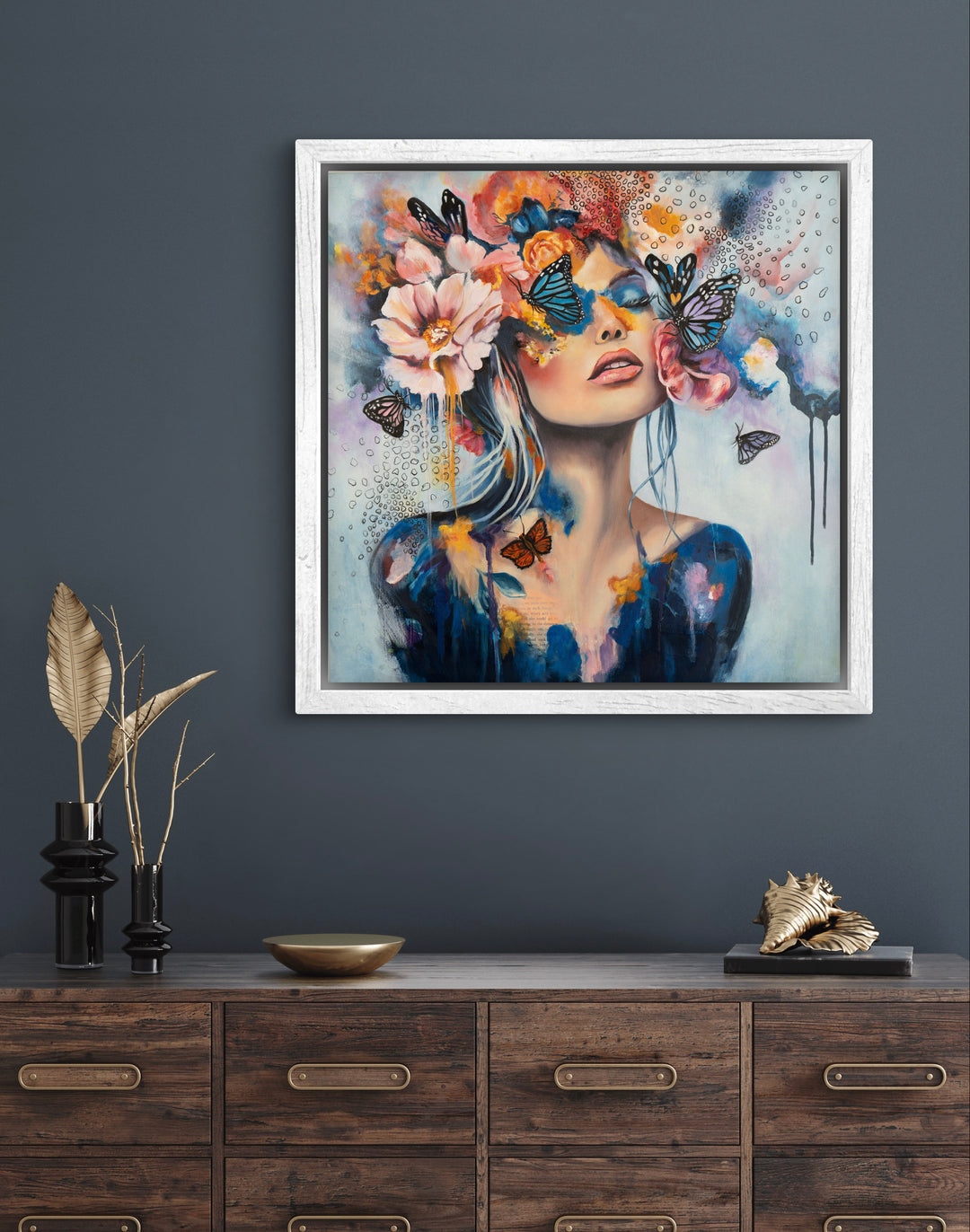The 'Butterfly Dreams' by Tash Bardot hung in a serene bedroom setting. A dreamlike, expressive painting that brings a quiet rebellion and visual relief to modern spaces.