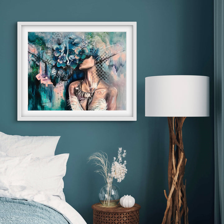 Introspective portrait 'Hidden Haven' by Tash Bardot hung in a luxurious, contemporary bedroom. The blue hydrangea fine art print serves as a visual anchor for protecting your peace.