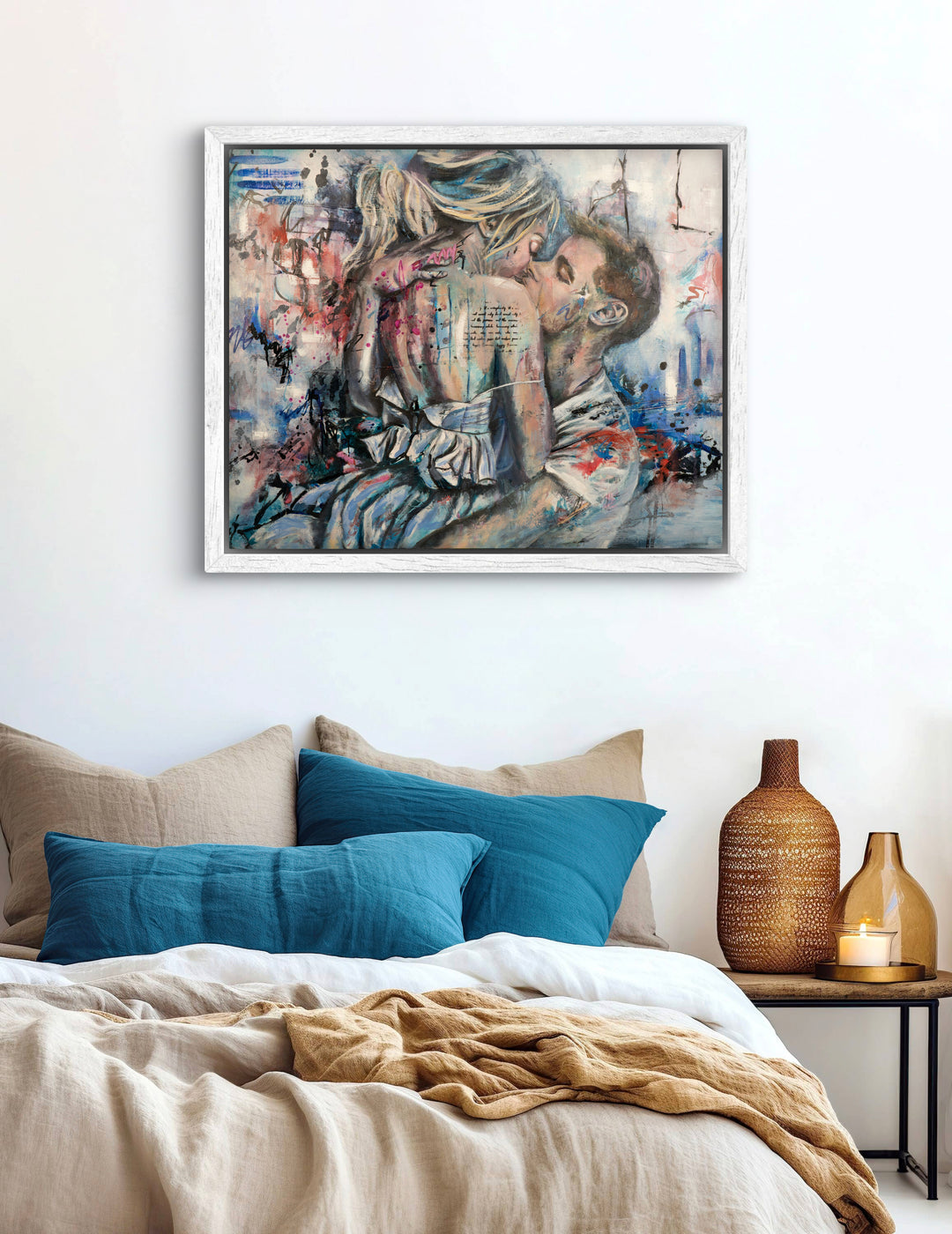 Dynamic couple painting 'Kiss of Promise' by Tash Bardot hung in a modern, light-filled loft. The abstract urban romance piece serves as a grounding visual anchor in the contemporary space.
