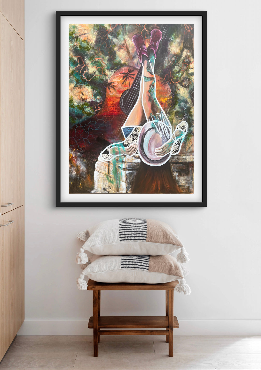 Vibrant, playful fine art print 'Melodies of Life' by Tash Bardot hung in a minimalistic  living area, serving as a joyful visual anchor.