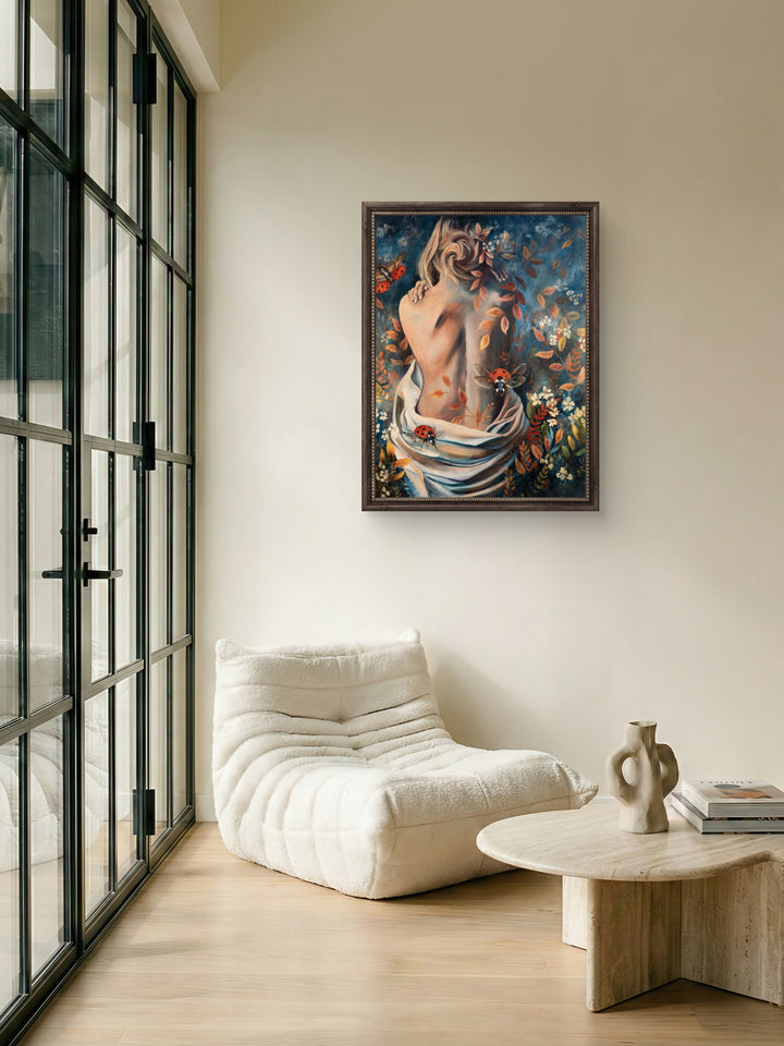 Nurtured in Time fine art canvas by Tash Bardot displayed on a wall in a modern living space, showcasing its vibrant blue and amber tones in a home setting.