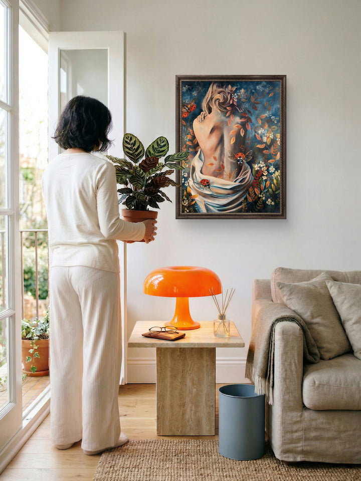 Nurtured in Time fine art canvas by Tash Bardot displayed on a wall in a modern living space, showcasing its vibrant blue and amber tones in a home setting.