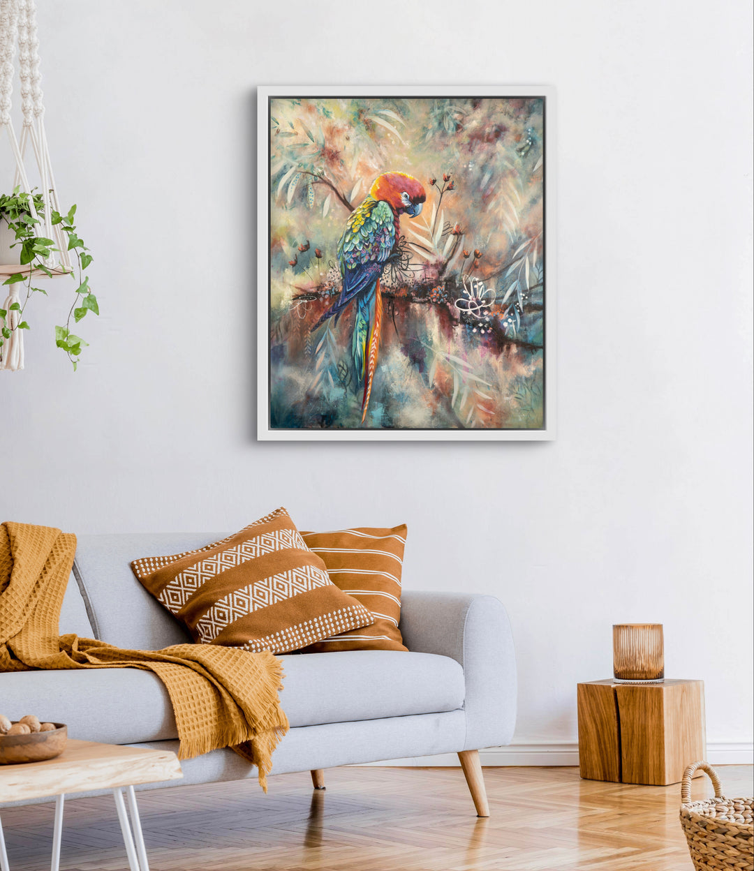 Contemplative parrot painting 'Poised and Proud' by Tash Bardot beautifully integrated into a cozy, private reading nook. The meditative bird portrait serves as a visual anchor for solitude and mindfulness.