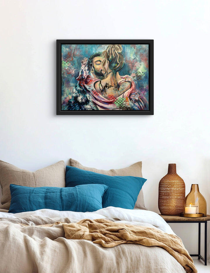 Romantic wall art 'Strength in Harmony' by Tash Bardot displayed above a bed in a serene, modern bedroom. The teal and pink painting featuring a couple, a wolf, and a flamingo serves as a visual anchor of partnership.