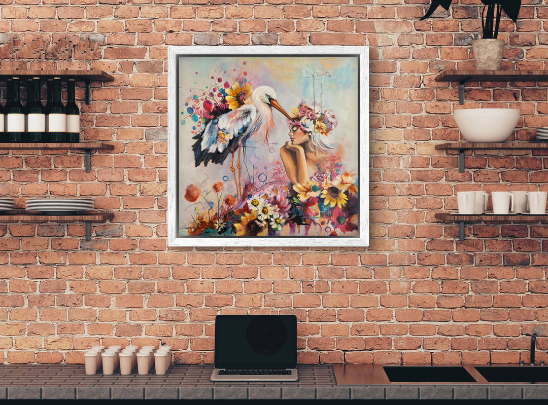 Expressive floral portrait wall art 'The Stork and I' by Tash Bardot displayed in a calming room interior. A vibrant, joyful painting offering visual relief and a private sanctuary for connection.