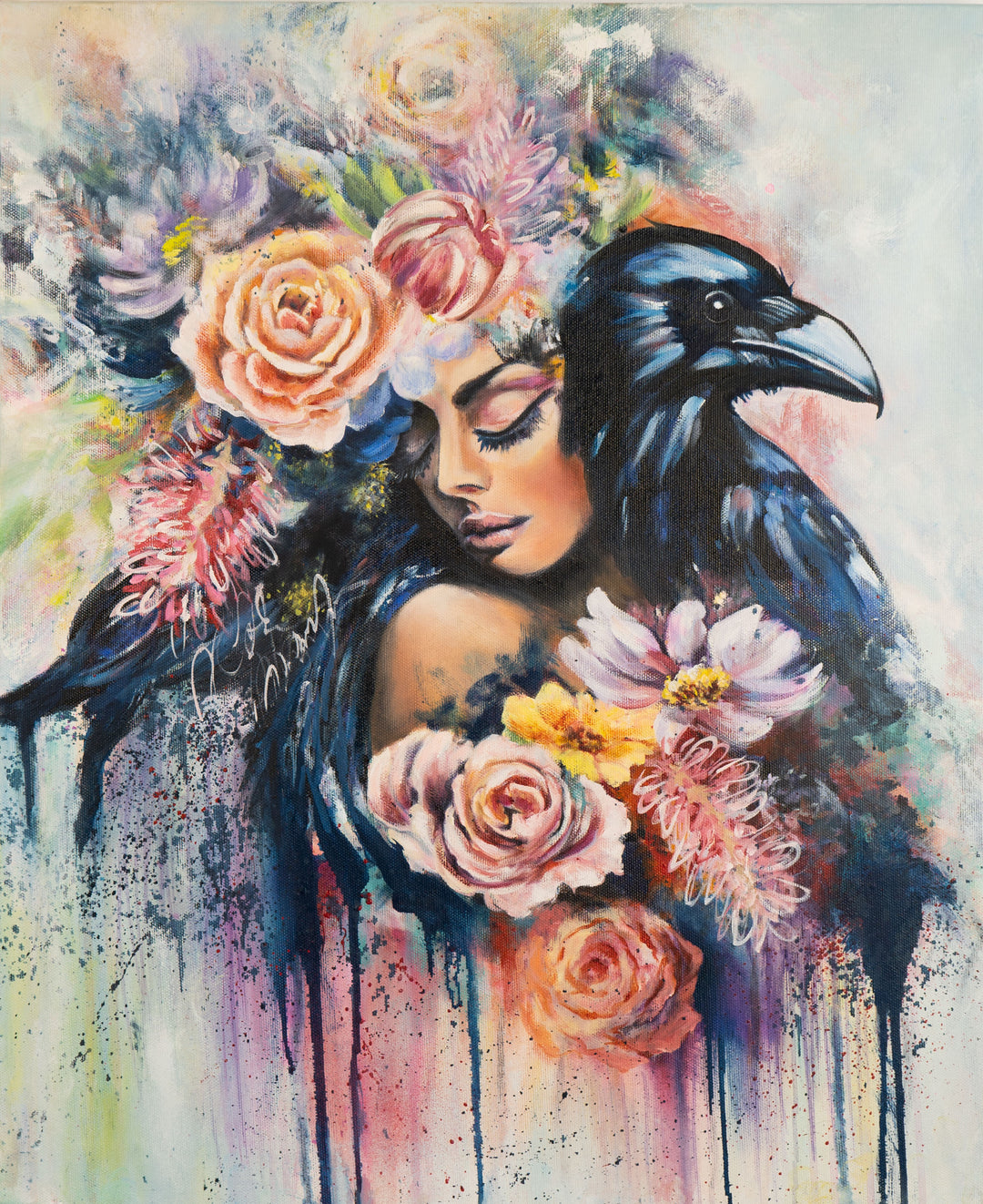 Tash Bardot's 'The Wise Crow' painting. An expressive portrait of a woman with closed eyes, her head resting against a crow's head, both surrounded by a cascading crown of pastel and bright flowers, painted with fluid drips and atmospheric blue and pink background tones.