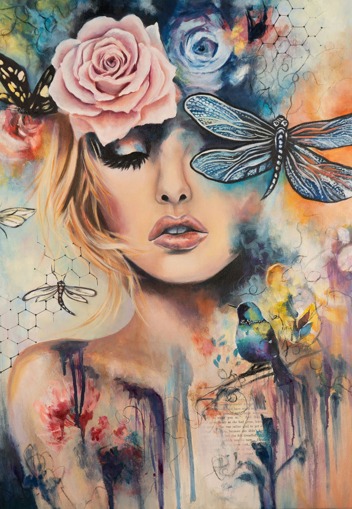 Tash Bardot's 'Wings of Clarity' painting. An expressive portrait of a serene woman with a large pink rose in her hair and a detailed blue dragonfly resting over her eye, surrounded by fluid paint drips, honeycomb patterns, and a small teal bird.